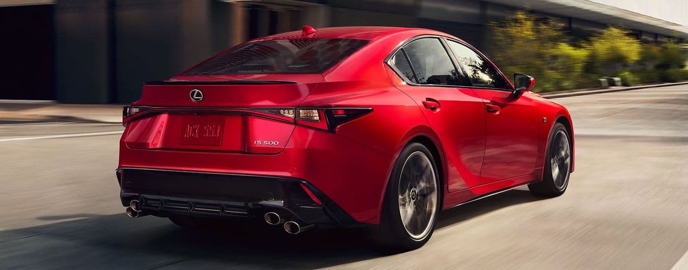 A red 2023 Lexus IS 500 F Sport is shown from the front at an angle.