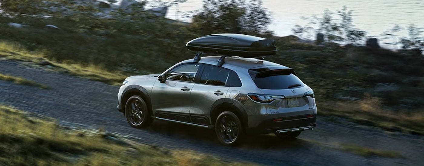 A grey 2023 Honda HR-V is shown from the side at an angle.